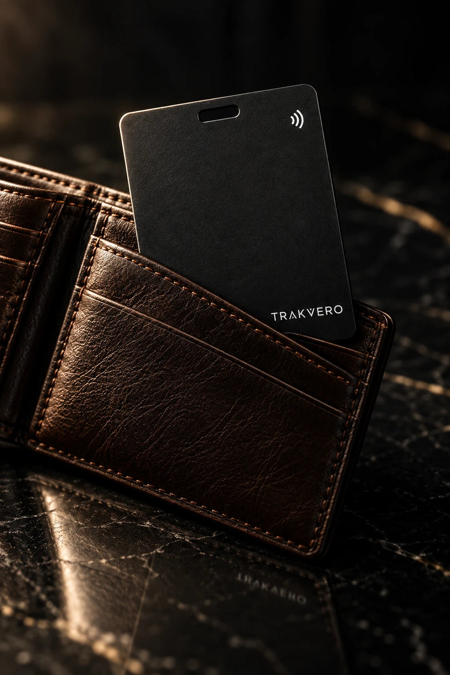 TRAKVERO card in a brown leather wallet